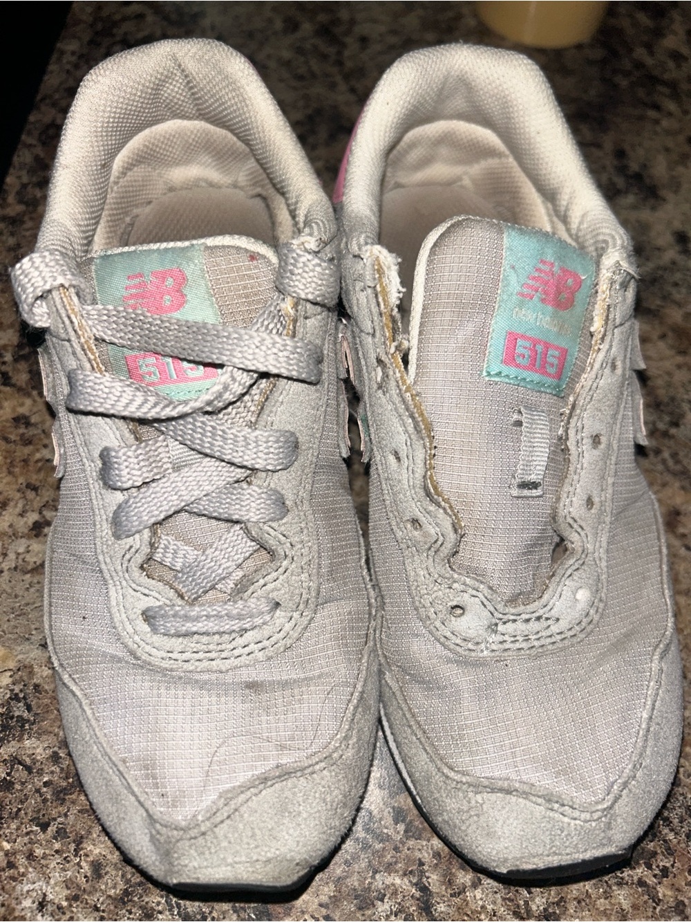 New Balance Kids Gray Sneakers with Pink and Teal Accents